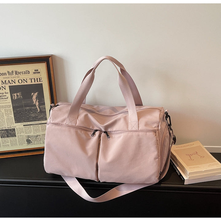 Sporty travel bag with expandable compartments Bowlift