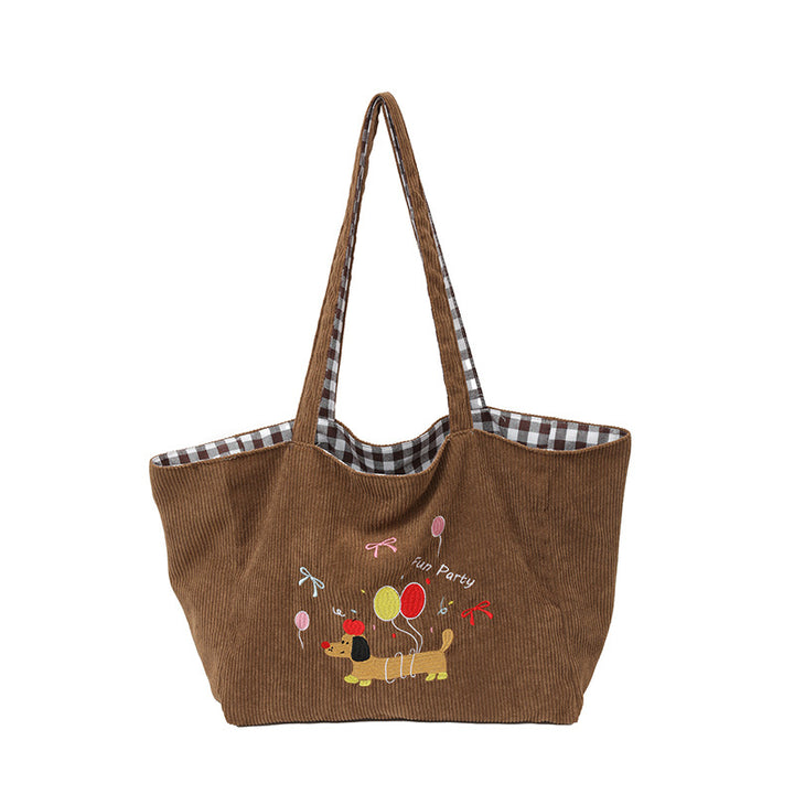 Cotton bag with playful dog motif Bowlift