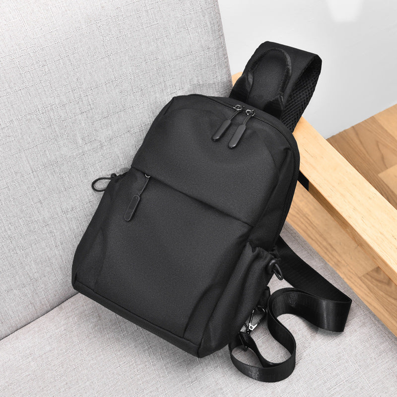 Sling backpack with multiple compartments and ergonomic design Bowlift