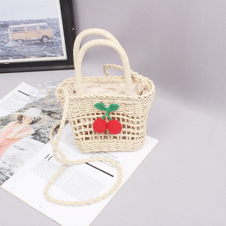 Basket bag with hand-knotted appliqués Bowlift