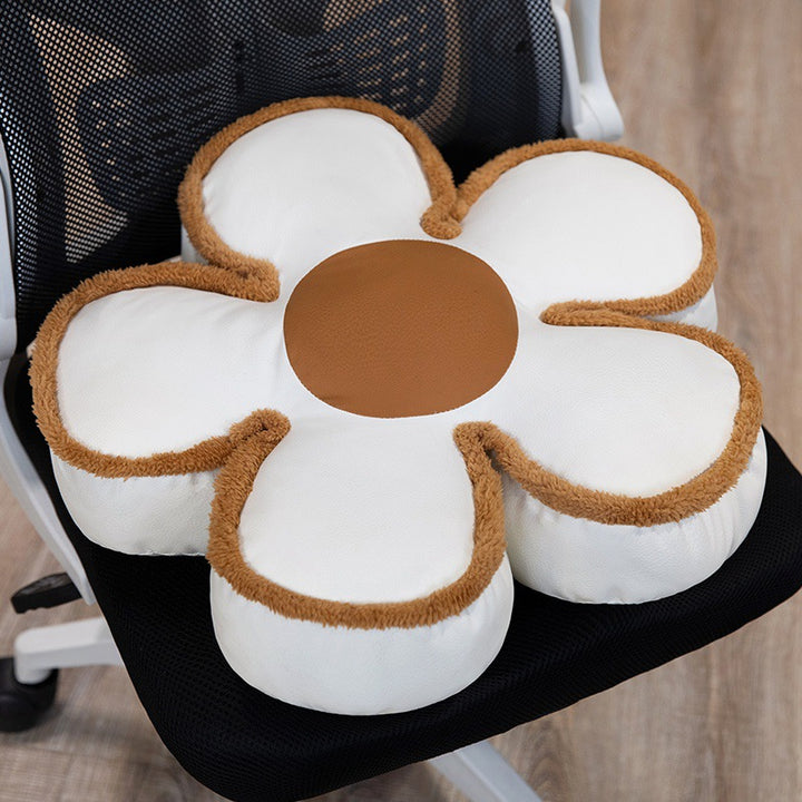 Padded seat cushion in flower shape with faux leather center piece and fluffy edge padding