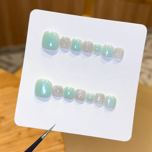 Acrylic nail set with glitter and pastel accent Bowlift