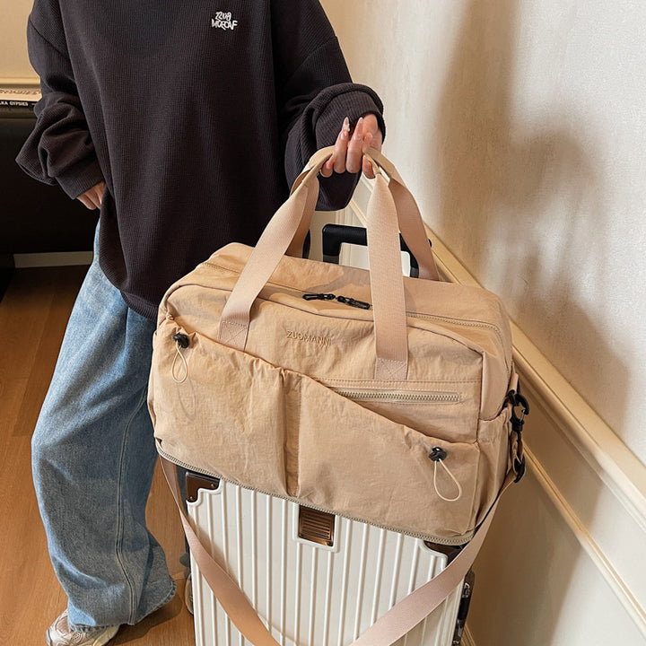 Travel bag with multifunctional compartments Bowlift