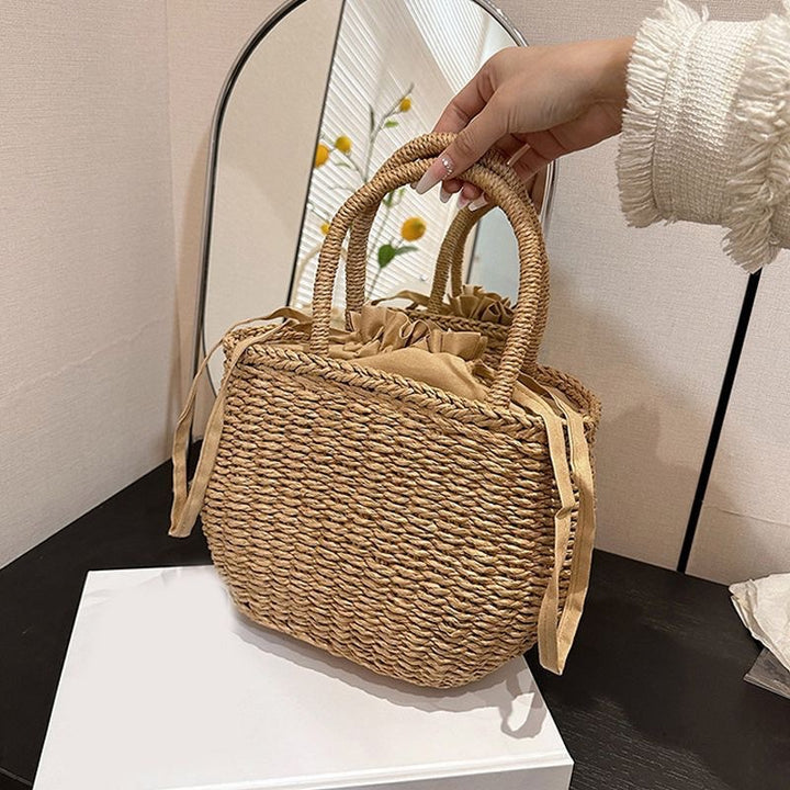 Handwoven basket bag with elegant bow Bowlift
