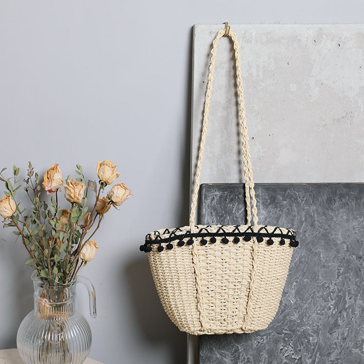 Delicate beach bag with pompons Bowlift