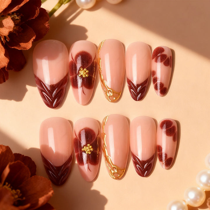 Exclusive artificial nails with floral designs and gold embellishments Bowlift