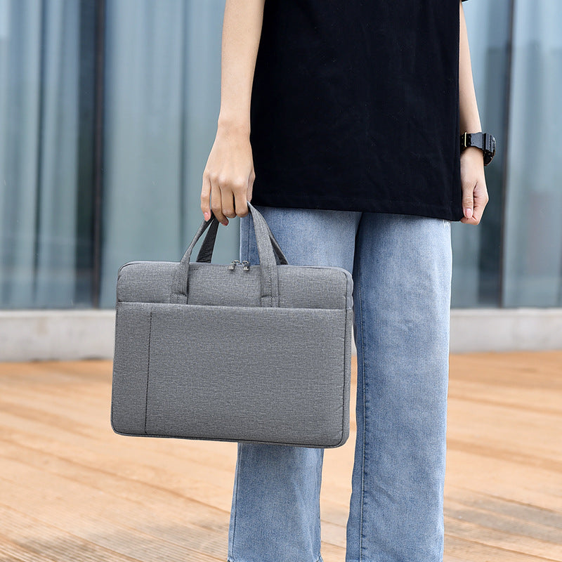 Laptop and briefcase in modern, minimalist design Bowlift