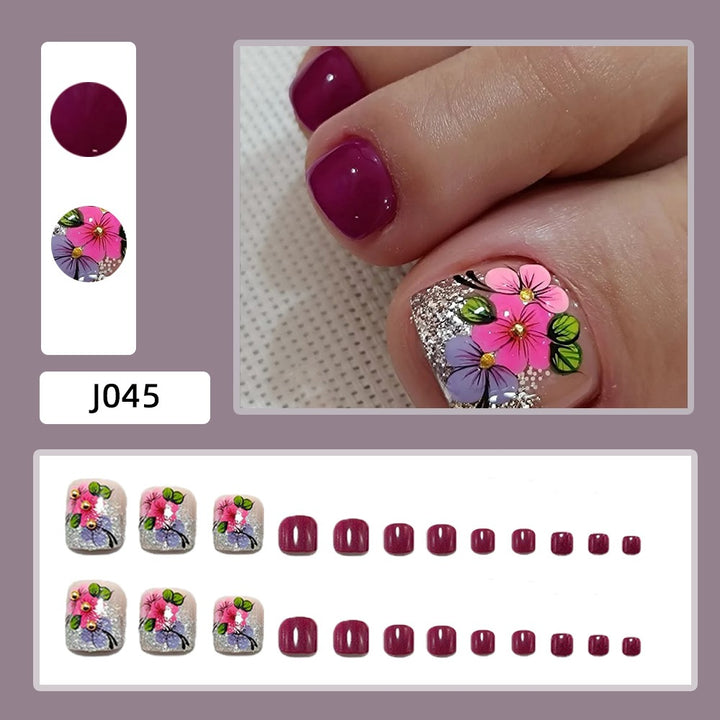 Artificial nails with floral motifs and glitter accents Bowlift