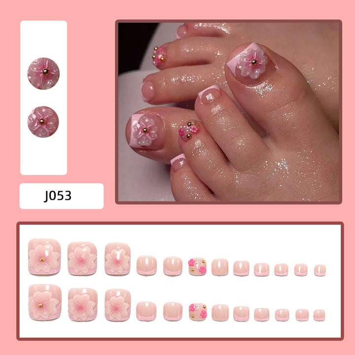 Artistic toenails with 3D flower appliqués Bowlift