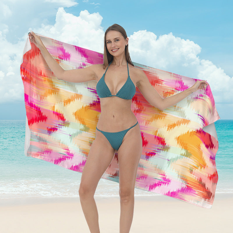 Beach towel with vibrant tropical plant motif Bowlift