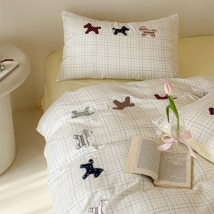 Children's bedding set made of cotton with embroidered dog appliqués and check pattern Bowlift