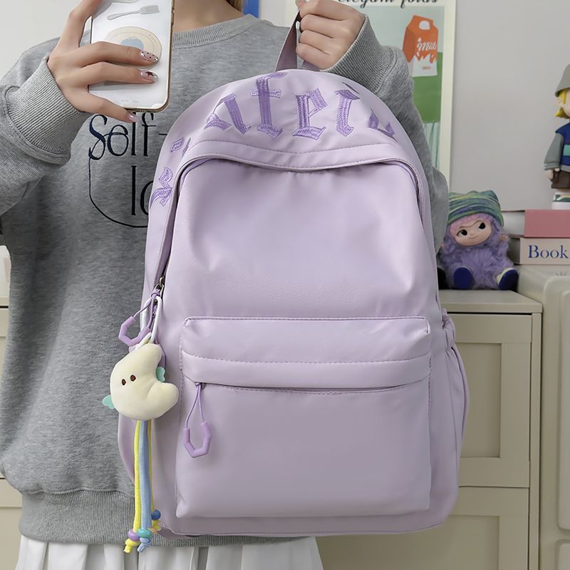 Fashionable backpack with removable charms Bowlift