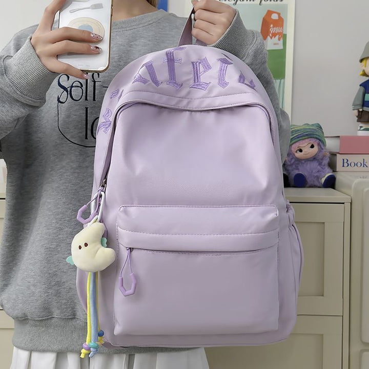 Fashionable backpack with removable charms Bowlift