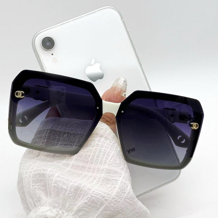 Ladies Fashion Sunglasses with distinctive square frame and luxurious accents Bowlift
