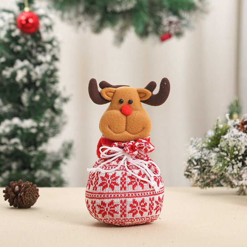 Cute Christmas gnome with gift sack Bowlift