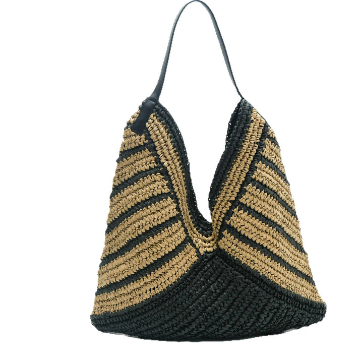Leisure bag made of braided natural material Bowlift