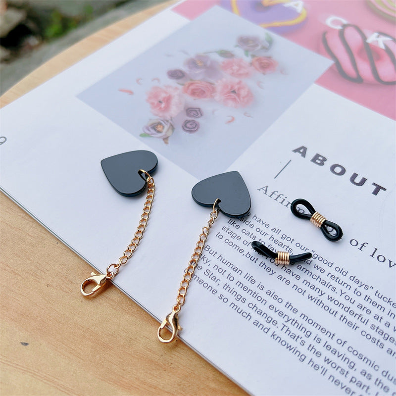 Heart-Shaped Dangle Earrings with Golden Chain Bowlift