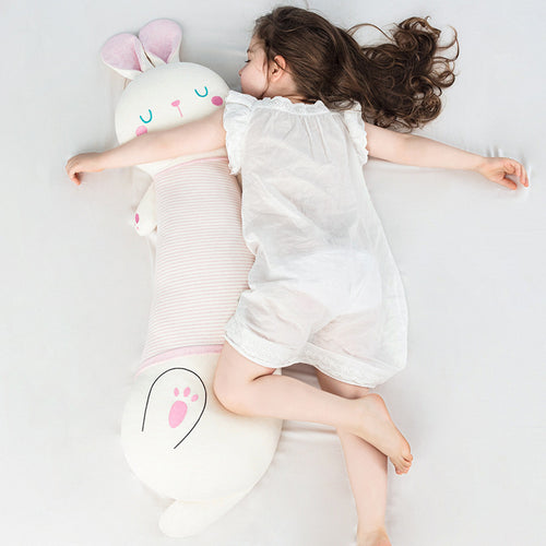 Oversized plush body pillow in bunny shape with ergonomic cuddle head