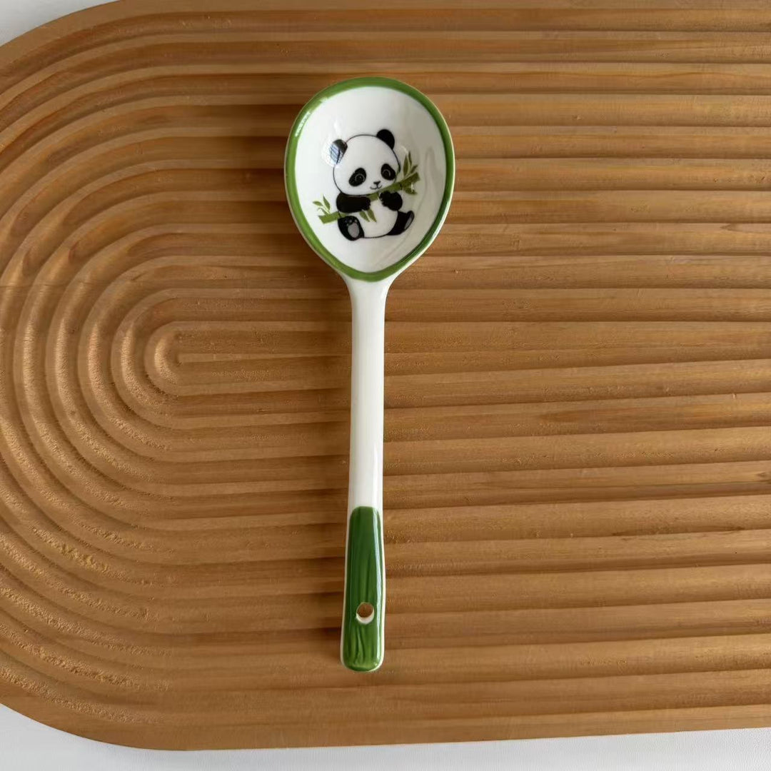 Ceramic soup spoon with lucky cat illustration and ergonomic long-handle Bowlift