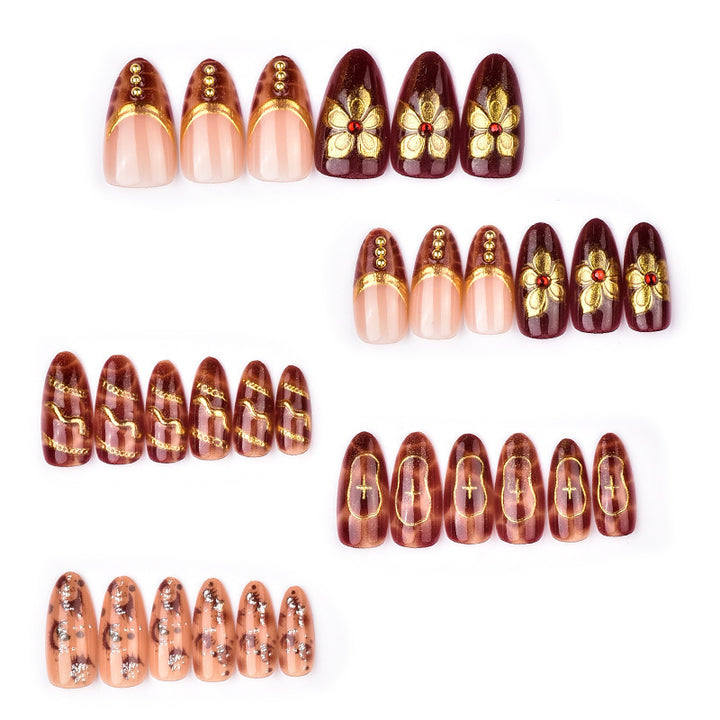 Deluxe artificial nails with golden accents Bowlift
