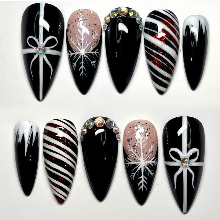 Artificial nail set with festive design and glitter accents Bowlift
