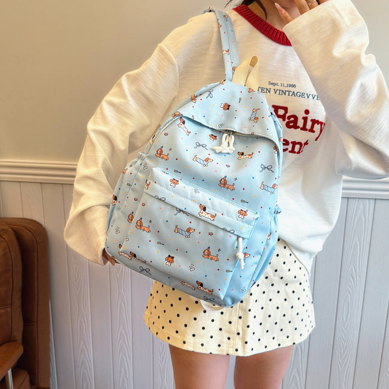 Backpack with Cheerful Dog Motif Bowlift