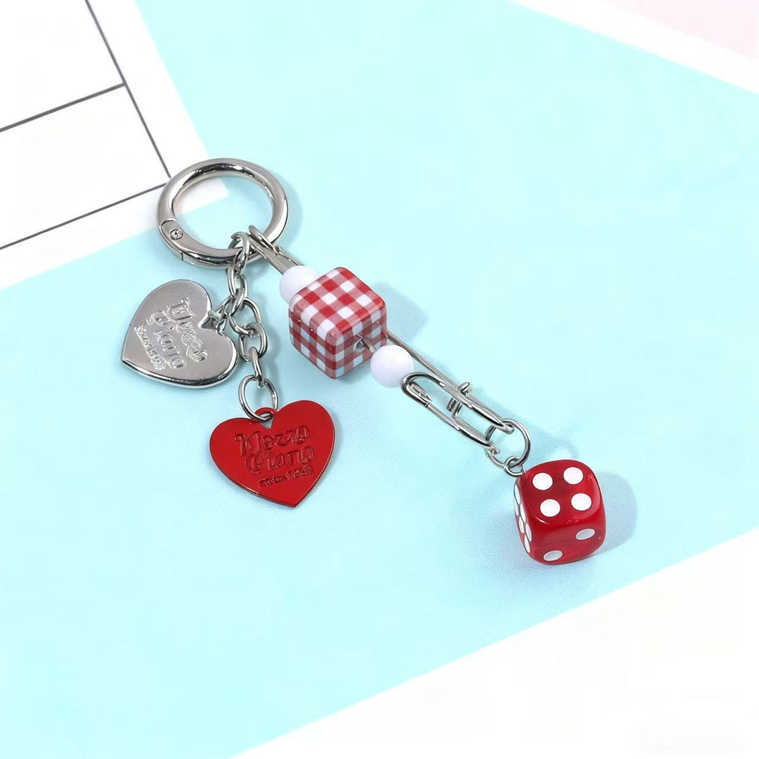 Playful Dice-Inspired Keychain Bowlift