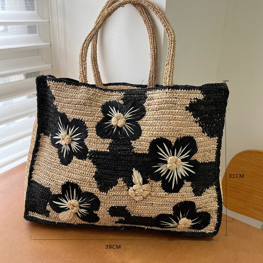 Handcrafted knitted bag with floral design Bowlift