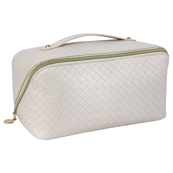 Cosmetic transport bag made of high-quality braided synthetic leather with practical zipper and carrying handle Bowlift