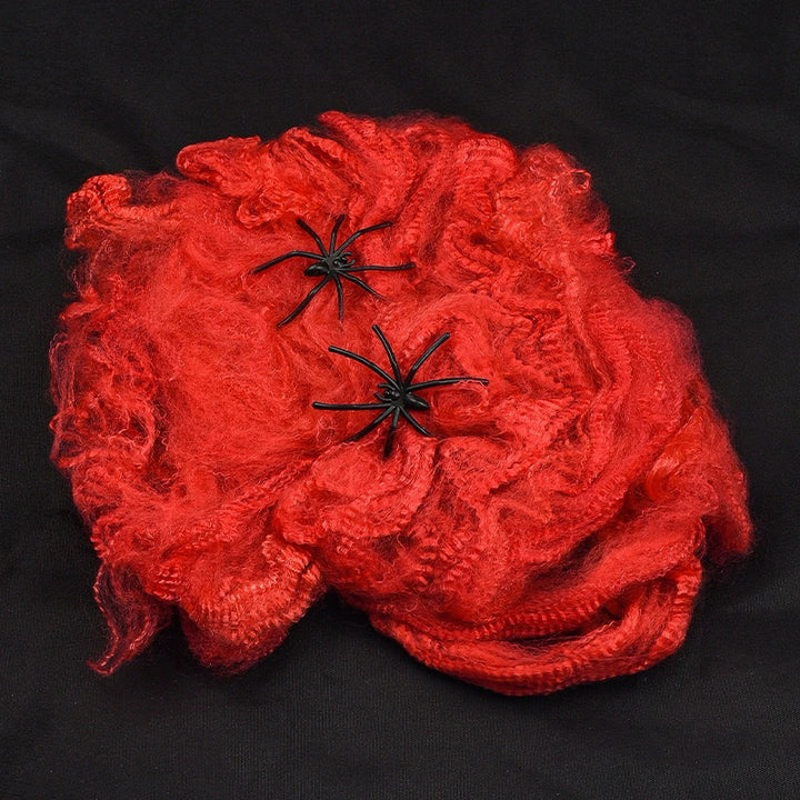 Decorative Halloween spider web with artificial spiders