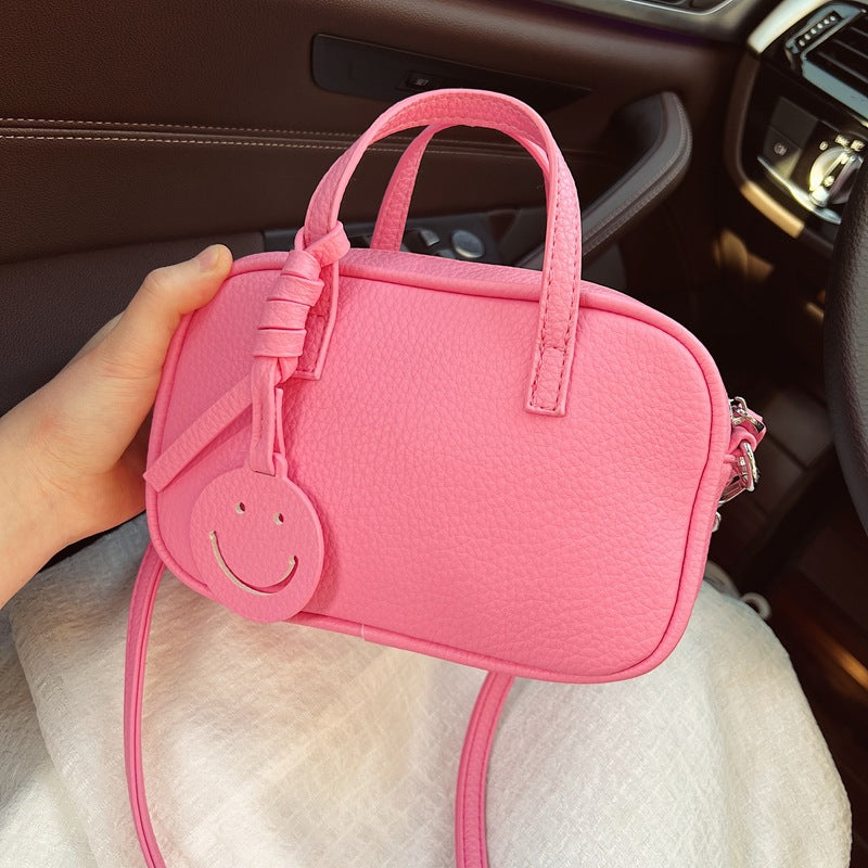 Compact Textured Mini Handbag Bowlift