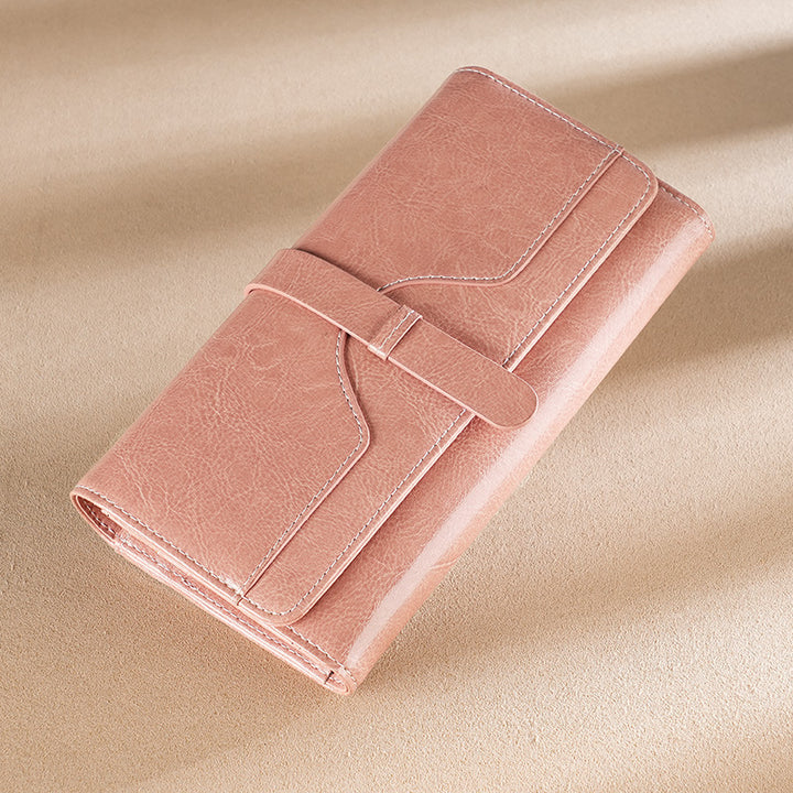 Premium leather long wallet clutch with strap closure and multiple card slots Bowlift