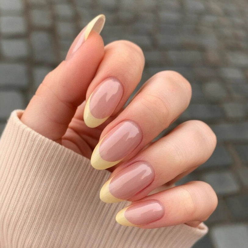 Nail tips with elegant French-tip design Bowlift