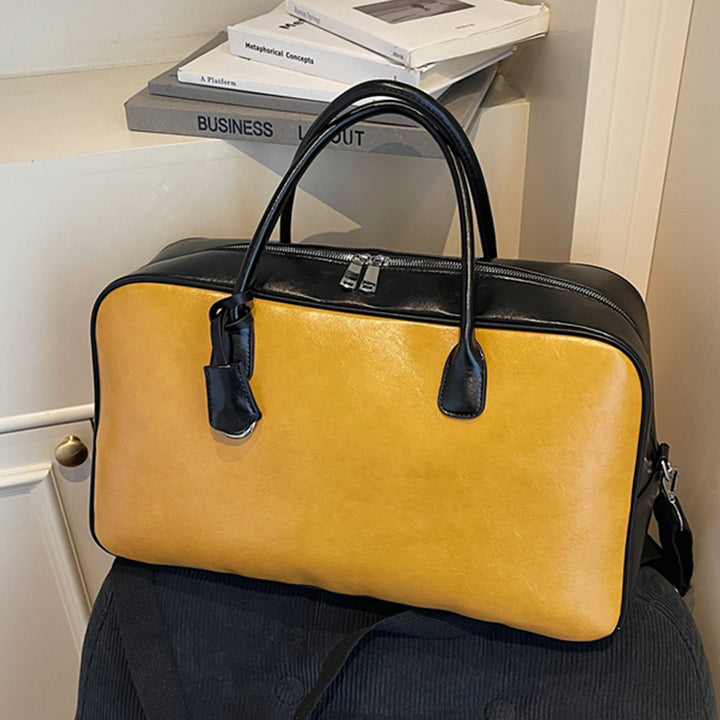 Elegant and Spacious Travel Bag Made of Faux Leather Bowlift