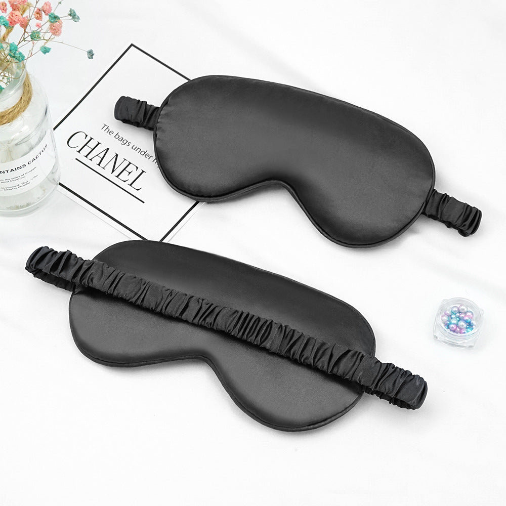 Women's breathable satin eye mask with ergonomic curvature, soft padding and gathered anti-slip band Bowlift