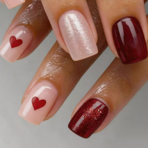 Art nail set with heart designs and glitter Bowlift