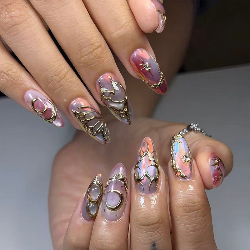 Acrylic nail set with glamorous 3D designs and elegant gold accents Bowlift