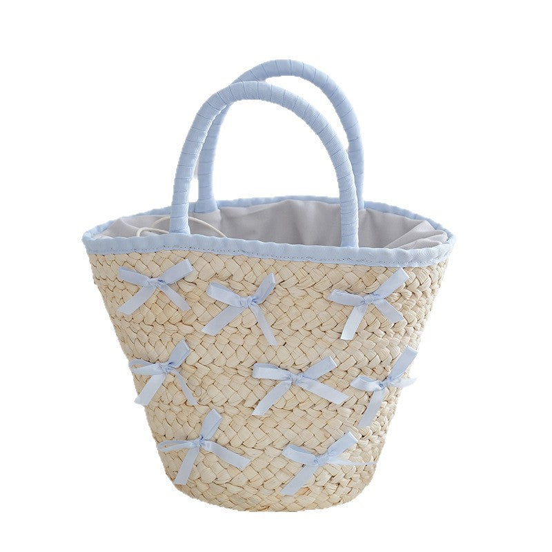 Basket bag with delicate bows and Bowlift lining