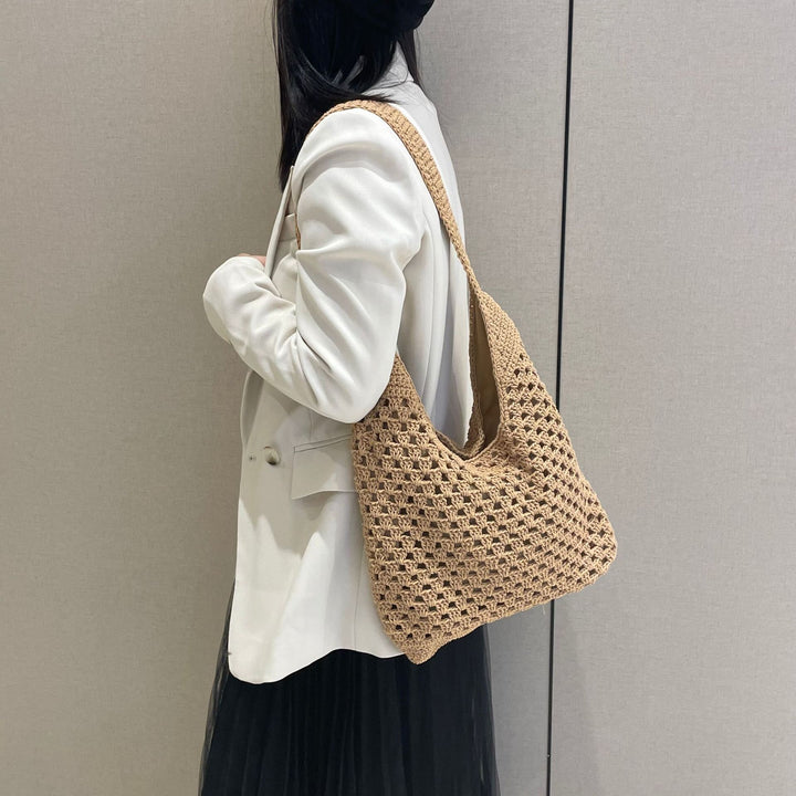Hand-knotted shoulder bag in modern net design Bowlift