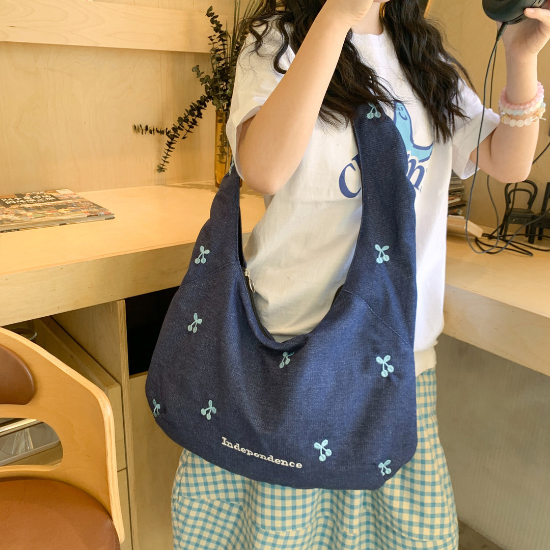 Comfortable shoulder bag with original embroidery motif Bowlift