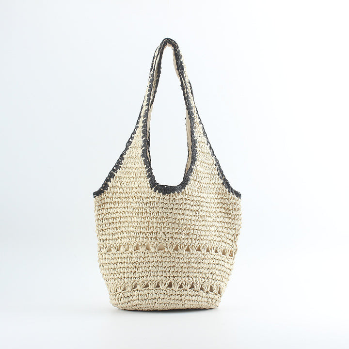Beach shoulder bag made of hand-woven raffia with elegant lace trims Bowlift