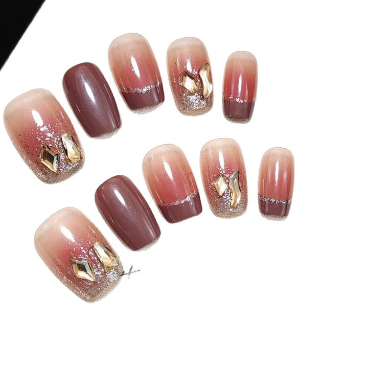 Acrylic nails in elegant ombre design with glitter elements Bowlift