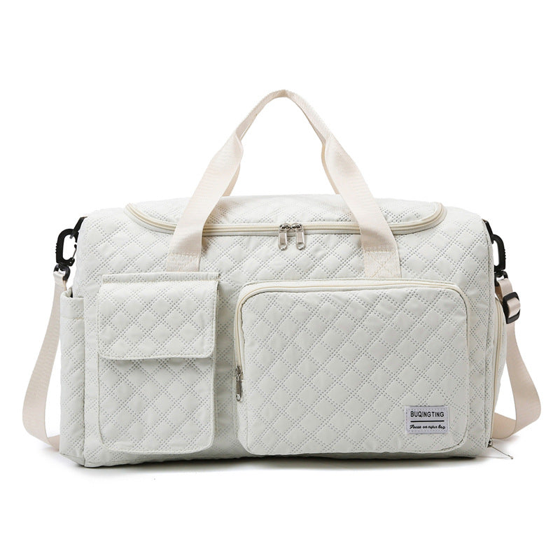 Spacious Quilted Weekend Duffle Bag Bowlift