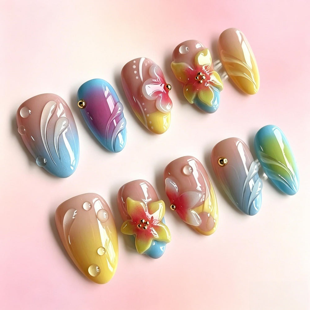 Acrylic nail set with floral elements and colorful accents Bowlift