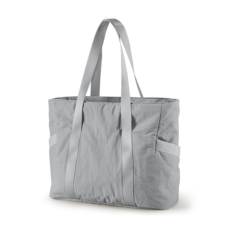 Spacious tote bag with side pockets Bowlift