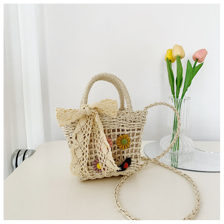 Playful basket bag with floral accents Bowlift