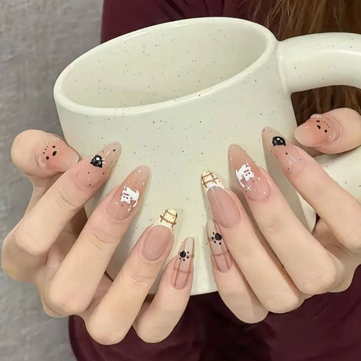 Artistic Press-On Nail Extensions with Floral Embellishments Bowlift