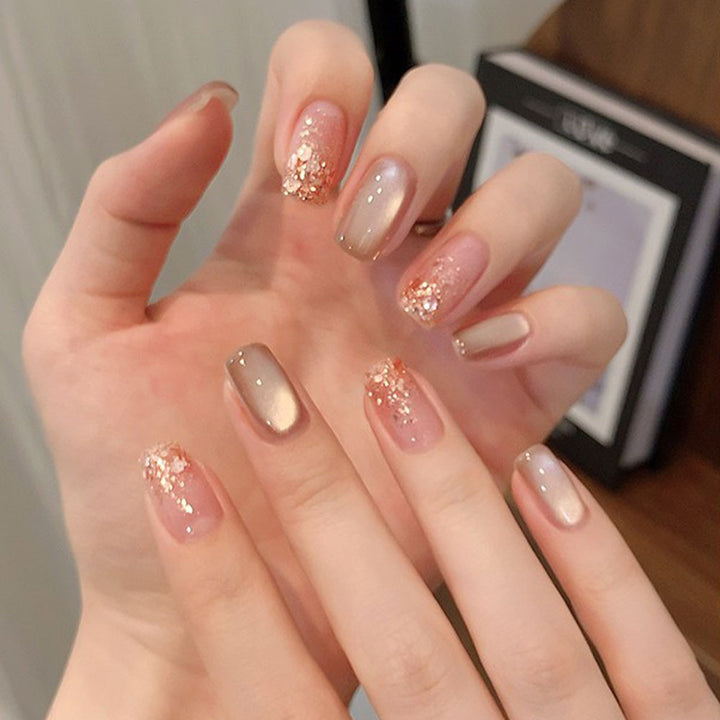 Glamorous artificial nails with glitter and ombre design Bowlift
