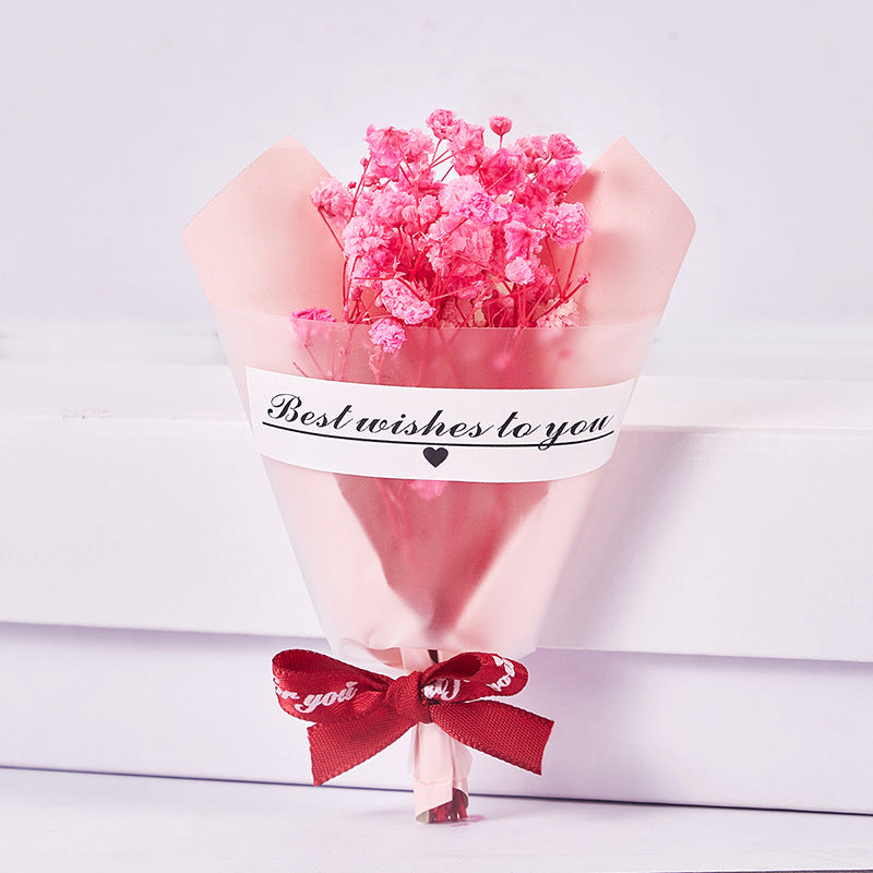 Mini Faux Rose Petal Gift Bouquet With Satin Ribbon Bow And Translucent Cone Wrap
