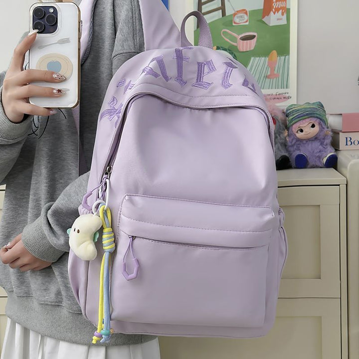 Fashionable backpack with removable charms Bowlift